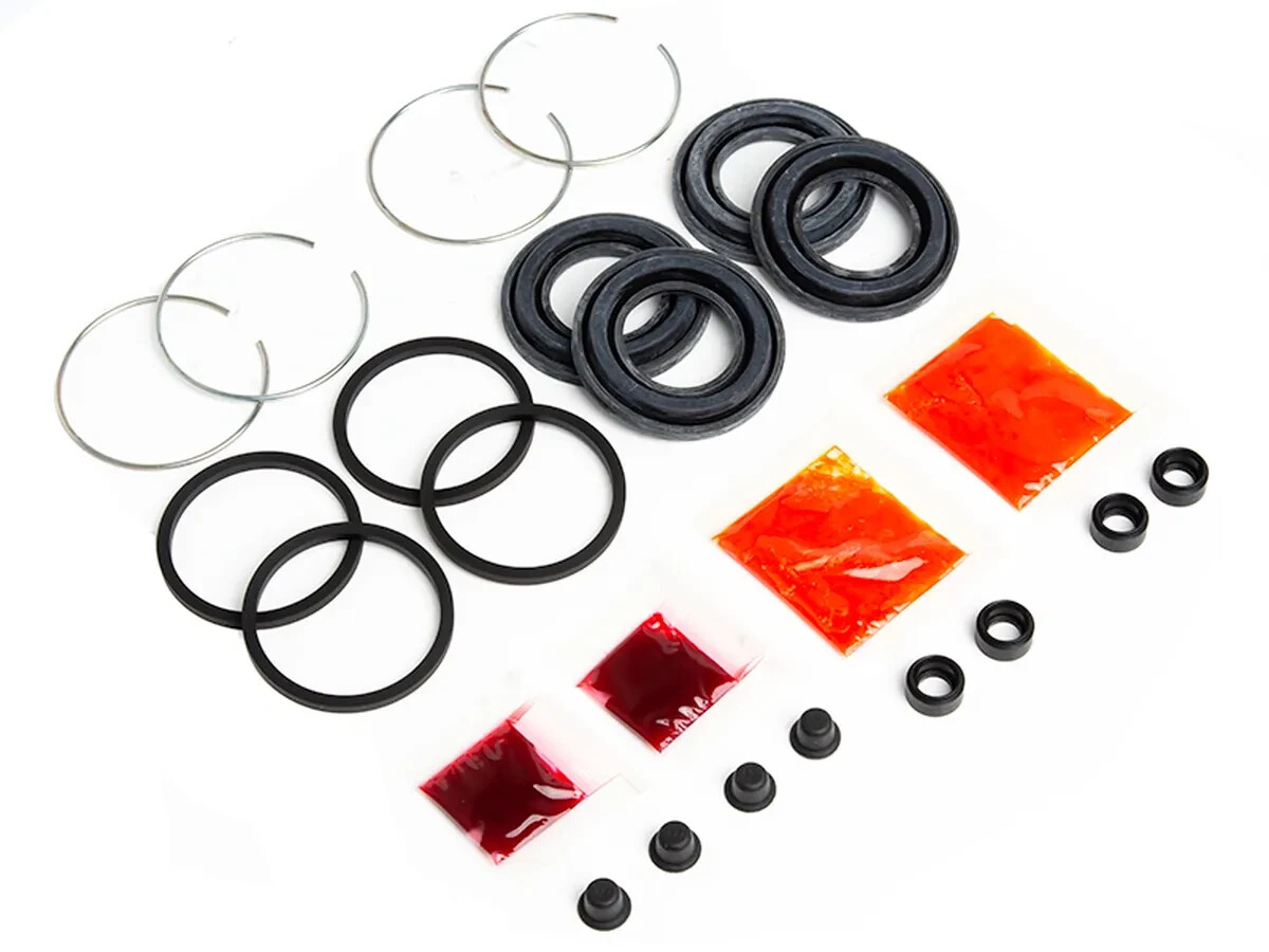 Genuine OEM Nissan Rear Akebono Caliper Rebuild Seal Kit P/N D4ABM