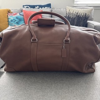 Vintage Coach Gotham Duffle Bag in the dark saddle/brown colorway.