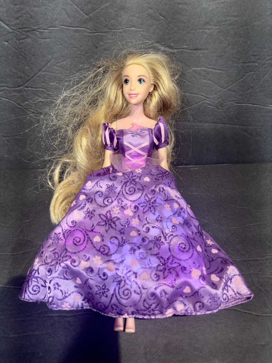 Sing and glow sales rapunzel doll
