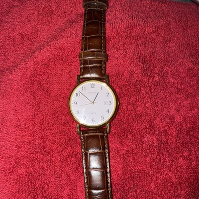 #ad Men’s Pulsar Gold Tone Watch with Date Brown Skin Band. $9.99
