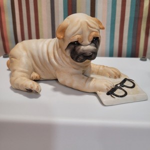Vintage 1987 Franklin Mint Bisque Shar-pei Dog Figurine with a pair of glasses