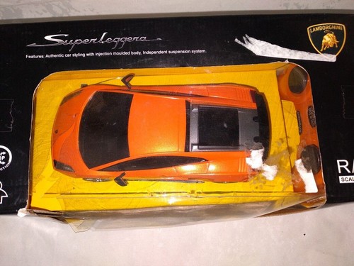 RASTAR LAMBORGHINI ORANGE SUPER LEGGEDA RC REMOTE CONTROL CAR AUTO 1:24 NIB - Picture 3 of 4