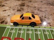LIFE-LIKE FORD THUNDERBIRD SLOT CAR, LIGHT ORANGE / YELLOW W/ LIGHTNING BOLTS