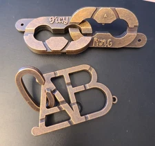 2 X Metal Brain Teasers ABC And The Key Ring