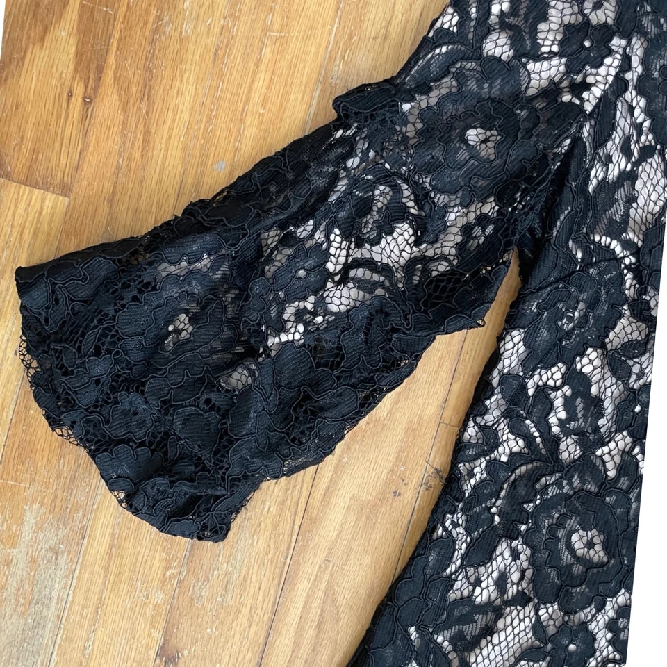 Vestido DKNY Negro Encaje Forro Desnudo Mangas Abullonadas 3/4 NUEVO CON ETIQUETAS $149 RV Talla 6 Fiesta Foto 3 de 4