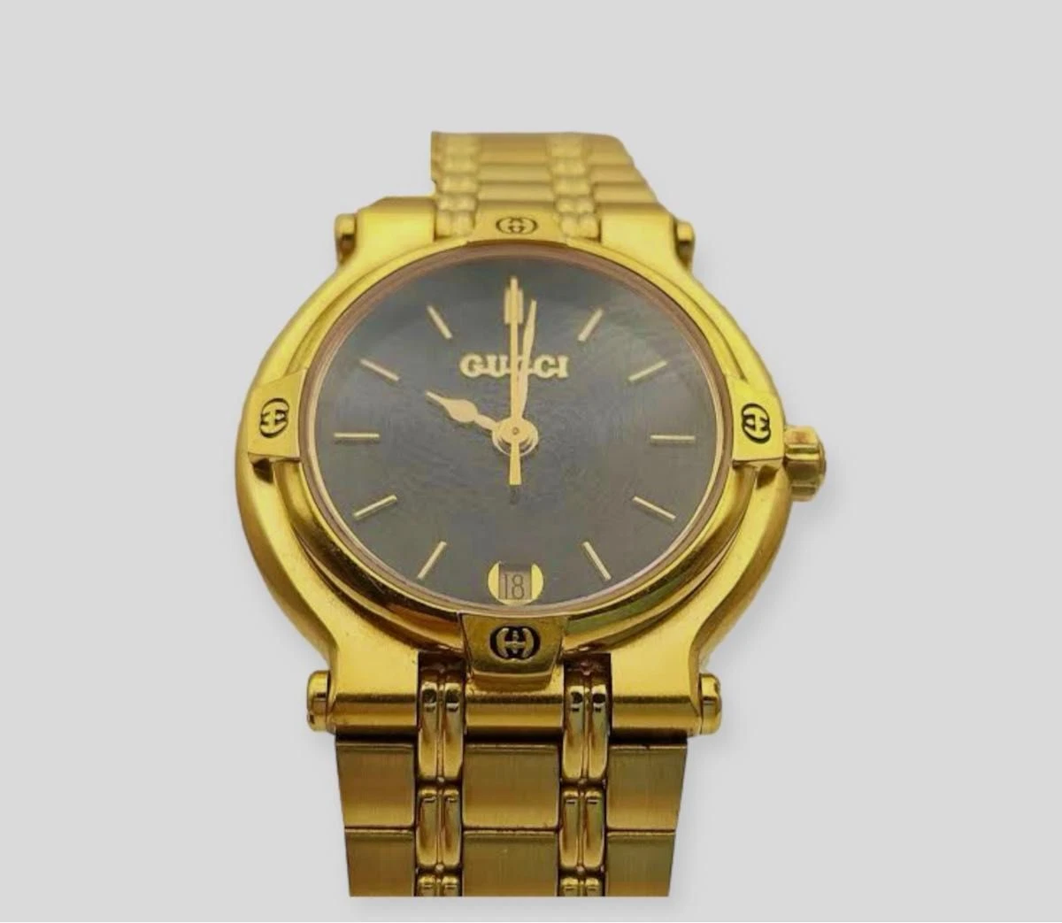Montre Gucci 9200L femme cadran noir or ancienne Gucci pile est morte