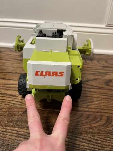 Bruder CLAAS Lexion 480 Combine Harvester with Mowing Attachment & Trailer 1:20 - Picture 14 of 17