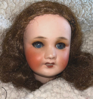 Pretty old rosette or blueberry head with its original wig