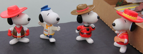 Lot of 4 1999 McDonald's Snoopy World Tour Spain, Germany, Wild West, Canada