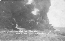 1921 Casper Wyoming Oil Tank Farm Fire Art Shop RPPC Postcard 25-11903