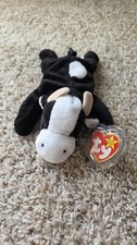 Ty Beanie Babies: Daisy. 1993/1994. With PVC Pellets. w/ tag in protective case
