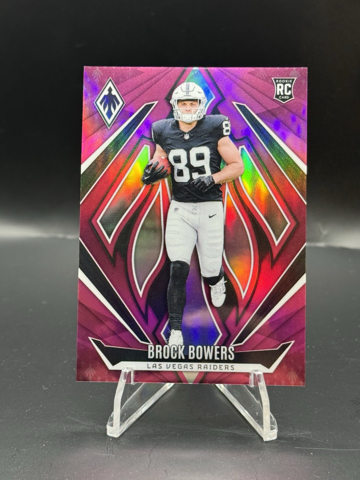 2024 Panini Phoenix - Rookies Brock Bowers #165 Pink /40 (RC)