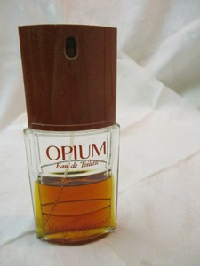 opium eau de toilette spray 3 oz