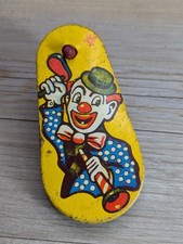 U.S. Metal Toy Mfg. Co. Party Noisemaker Spinning Rattler Tin Clown Green Base