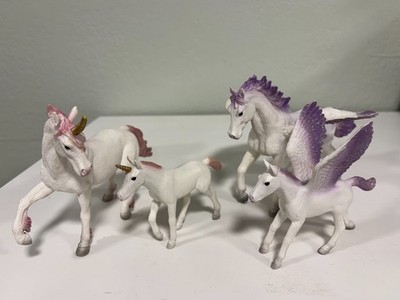 Pink glitter Unicorn mare and foal with Purple glitter Pegasus horse and foal