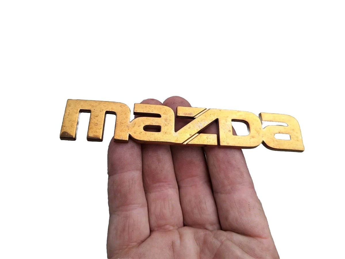 Mazda Trunk Emblem Badge Decal Logo GOLD Rear 3 6 626 Protege OEM