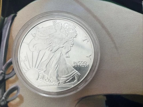 1 oz .999 Fine Silver WALKING LIBERTY ROUND. BU in CAPSULE