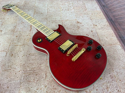 Custom-made red 6-string electric guitar, flame maple top, gold hardware