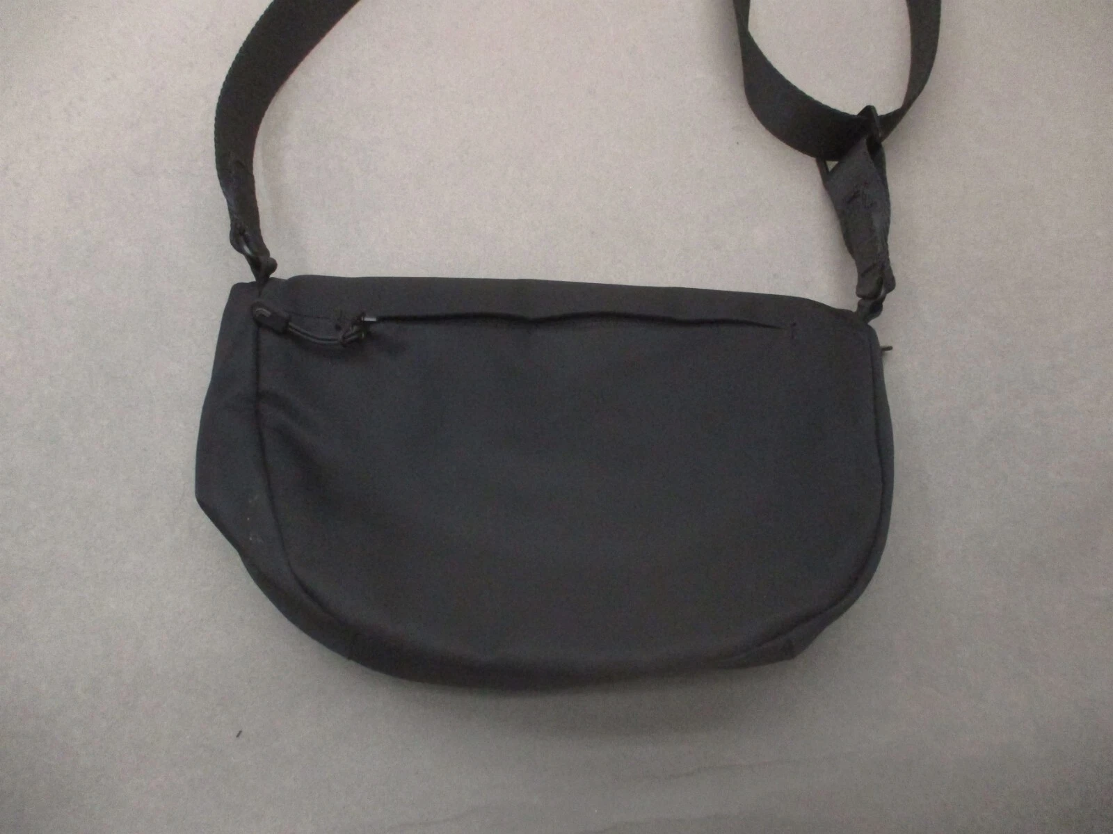 lole back zip pocket snap crossbody 
