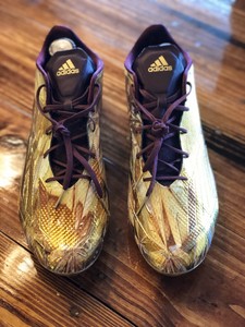 maroon and gold cleats