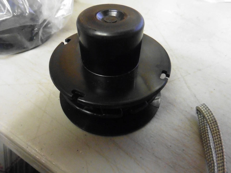 New Genuine Redmax BT25-90105Replacement Spool / Bobbin / Cord Holder  - Image 2 of 2