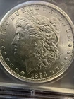 1884-O $1 Morgan Silver Dollar - ICG MS63