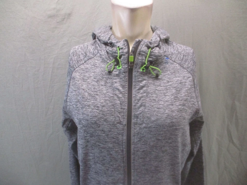 Chaqueta deportiva ligera de entrenamiento con bolsillo con cremallera completa gris talla M 2XU para mujer 660 Foto 2 de 4