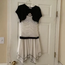 Girls Holiday dress Size 16, Black & White Amy’s closet Bust 24ins. Waist 22ins.