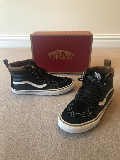 black white leather vans