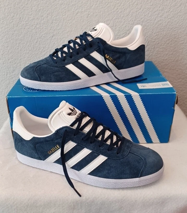 navy blue and white adidas gazelle