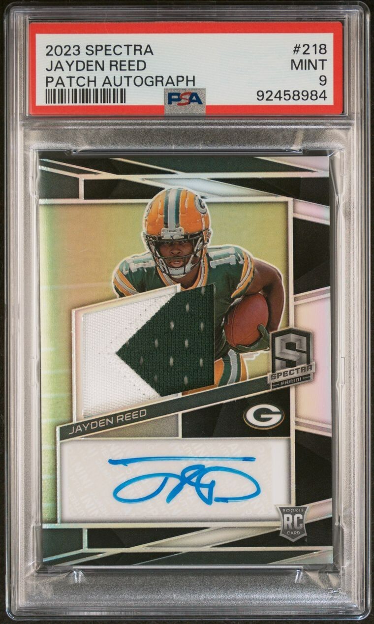 2023 Spectra - Rookie Patch Autographs #218 Jayden Reed /99 PSA 9 (AU, MEM, RC)