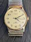 Vintage Timex Manual Wind Gold Tone Watch Water Resistant Arabic Dial Runs 70s