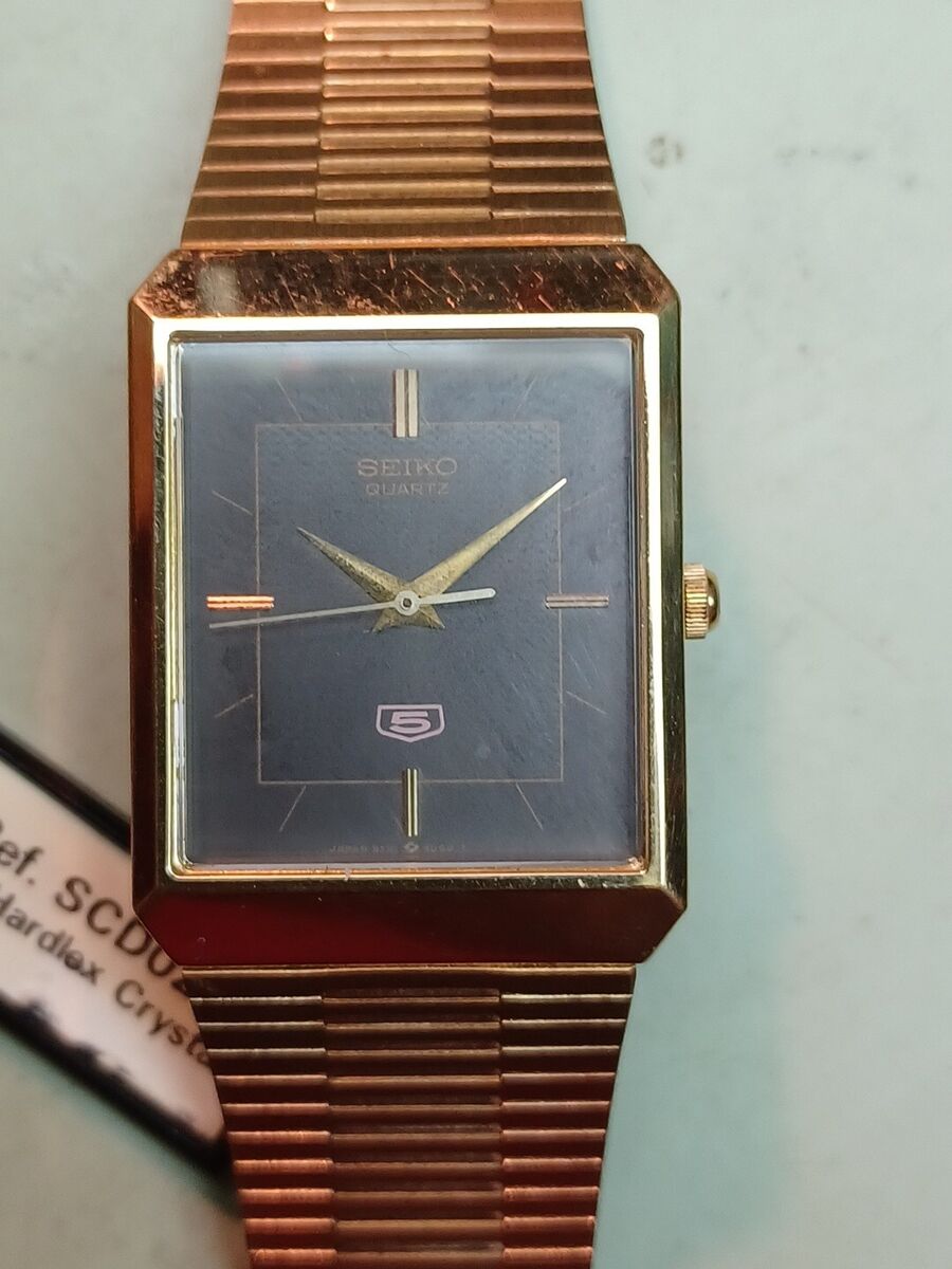 NOS MINT SEIKO 5 QUARTZ 27mm x 33mm DATE Golden Plated ORGNL NOS MINT SEIKO 5 QUARTZ 27mm x 33mm DATE Golden Plated ORGNL