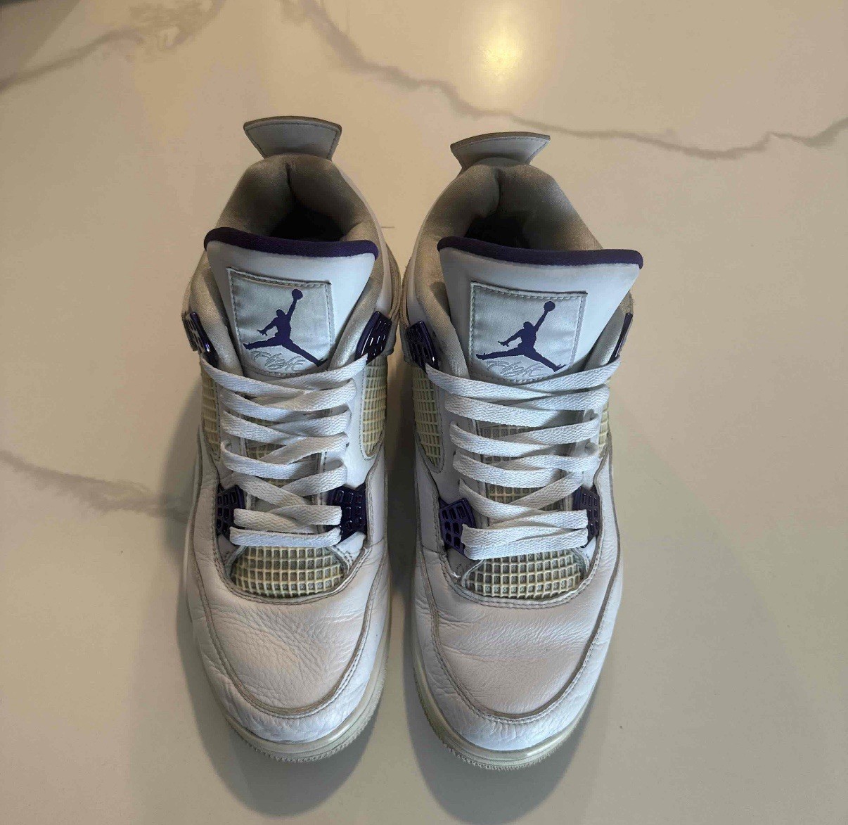 Metallic Purple Jordan 4’s