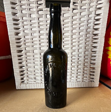 Vintage dark glass embossed beer bottle, John McIntyre, Bridge of Allan