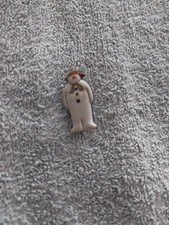 Age Concern Rubber pin badge Snowman
