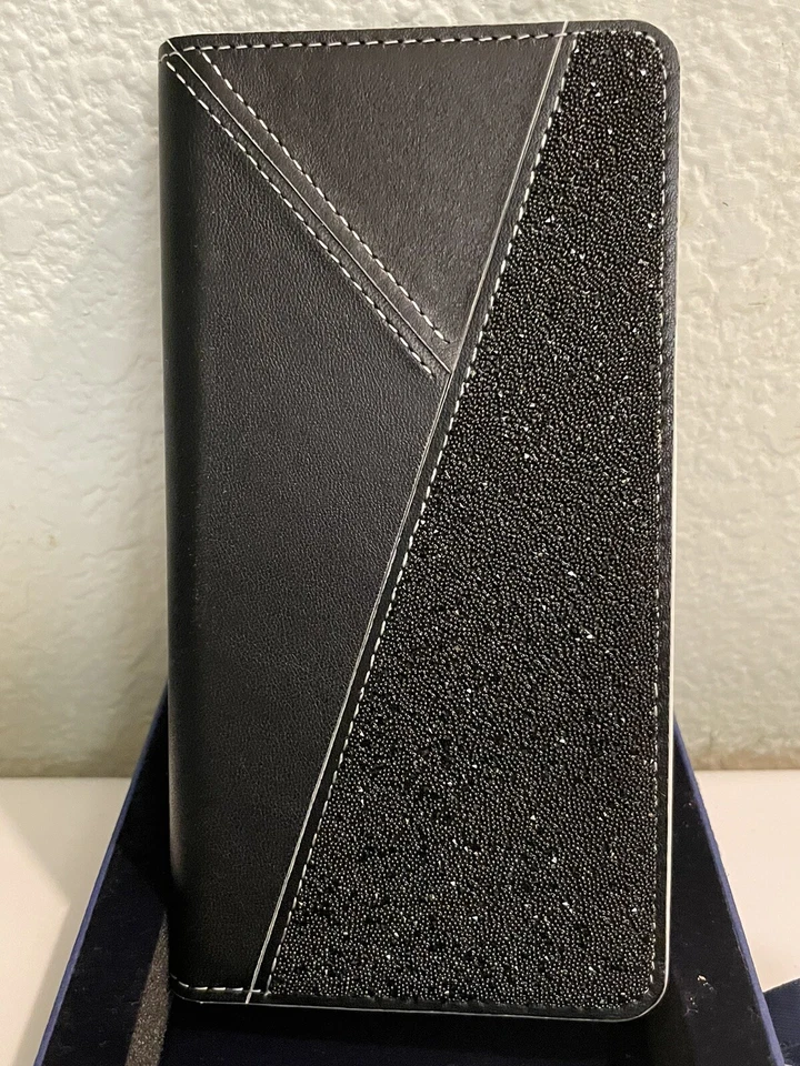 Funda Cartera Swarovski iPhone X con un bolsillo para tarjeta de crédito y espejo. Foto 3 de 4