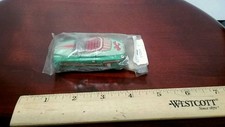Tin friction made in japan tin toy car in original package toy lot