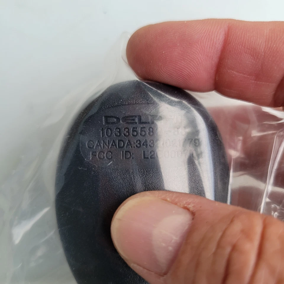 GM Delphi L2c0007T 10335587 Entrada sin llave Alarma remota Llave de 3 botones Foto 4 de 4