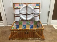 Vintage circa 1960’s picnic basket with newer 4 place setting. .