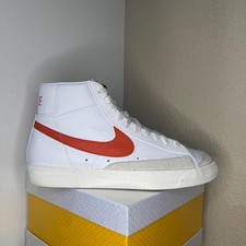 Nike Blazer Mid 77 Vintage sneakers in the classic White/Orange/Sail colorway.