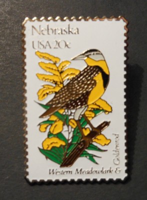 VTG USPS  POSTAL STAMP PIN   ''NEBRASKA USA 20c'' state bird & flower   hat   hat,