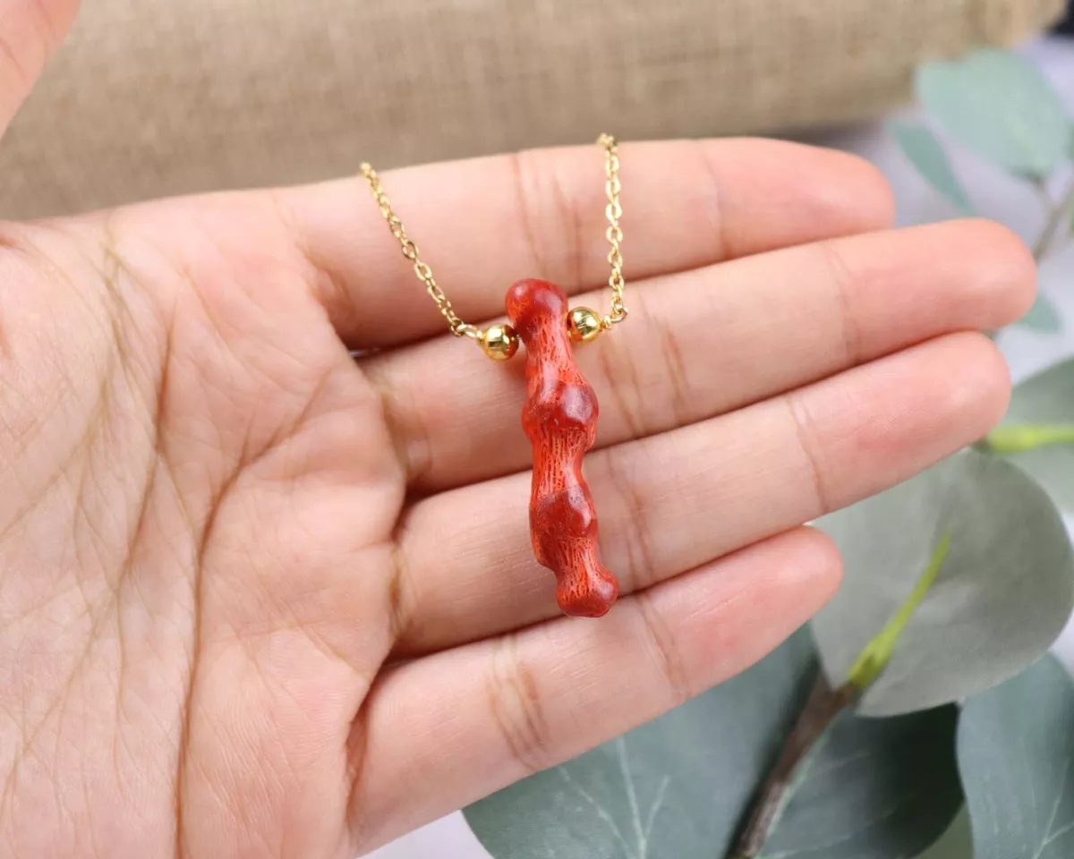 Coral store gold pendant