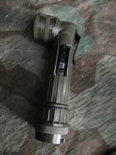 New old style reproduction green U.S. military flash light. In box.