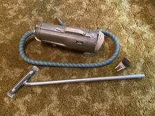 Vintage Electrolux Vacuum Model R — working and unused attachments