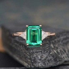 3 Ct Emerald Cut Green Emerald Three-Stone Engagement Ring 14K Rose Gold Finish