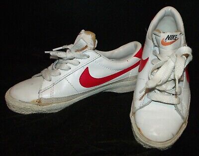 nike white sneakers with red swoosh