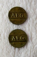HAUSHALTSAUFLÖSUNG 2X AEG Wert-Marke für Münzzähler, Wäschemarke, Wäschemünze
