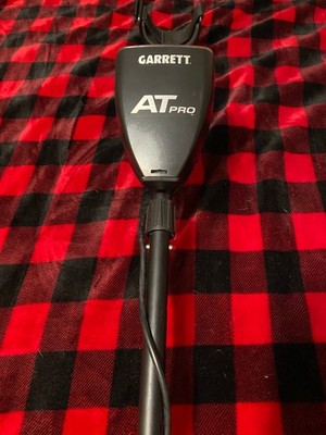 Garrett AT Pro metal detector w/ BONUS 14x11 Reaper coil, digger tool, finds bag
