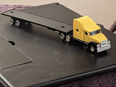 EXTRAORDINARY SUN YELLOW DIECAST TRACTOR TRAILER BY ERTL, 9.5''L X 1''D X 2'' H